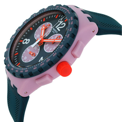 Swatch Moment of Rose SUSP400 with green chronograph dial, dark green tachymeter bezel, pink case and pushers, bright orange crown, and textured dark green strap.