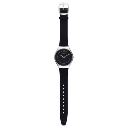 Swatch Skinalliage SYXS109 with black dial, polished silver-tone case, full black strap with adjustment holes, and Swatch-branded silver-tone buckle.