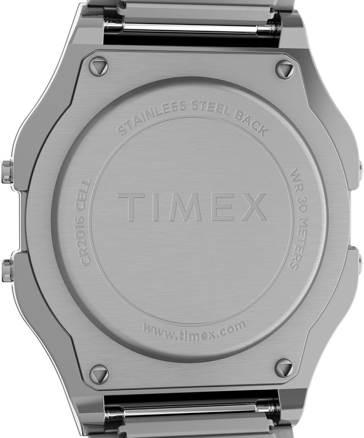 Reloj Timex digital de acero mostrado en vista trasera, destacando la tapa grabada y los tornillos.