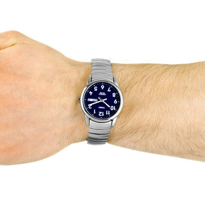 Timex Easy Reader Day Date T20031 men’s watch with blue dial and stainless steel expansion bracelet worn on the wrist.