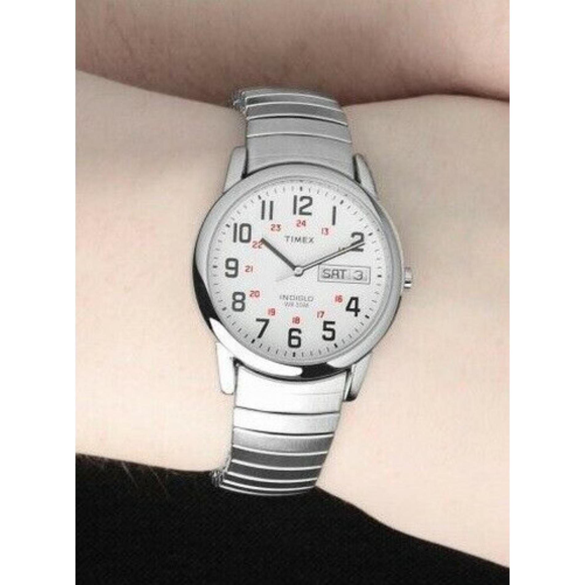 Timex Easy Reader Day Date T20461 men’s watch with white dial and stainless steel expansion bracelet worn on the wrist.
