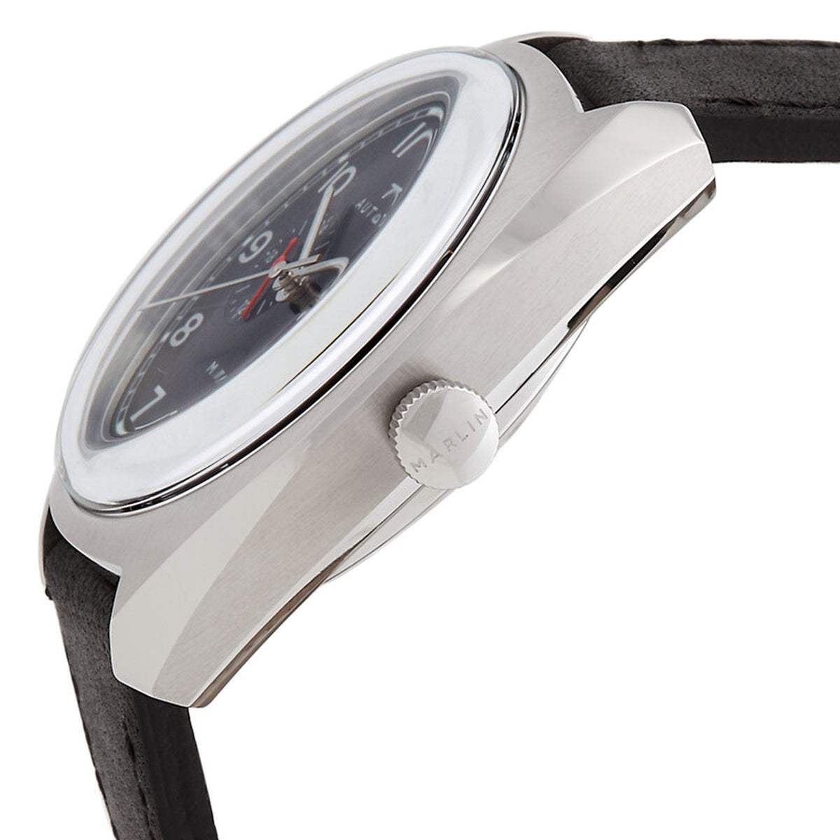 Timex Marlin TW2V62100 with domed crystal, brushed silver-tone cushion case, Marlin-branded crown at 3 o’clock, black dial, and black leather strap.