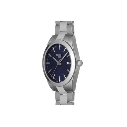 Reloj Tissot Gentleman T127.410.11.041.00 en vista de ángulo, con esfera azul, caja de acero pulido y cepillado, brazalete metálico y corona lisa a la derecha.