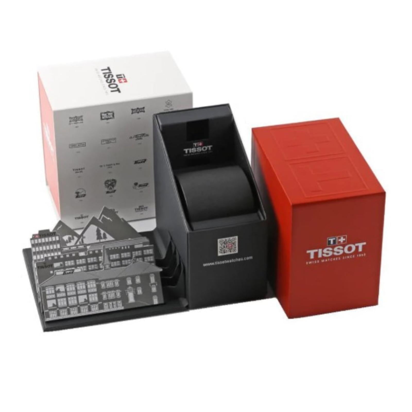 Original Tissot watch packaging set with red presentation box, black display case and branded documentation accessories.