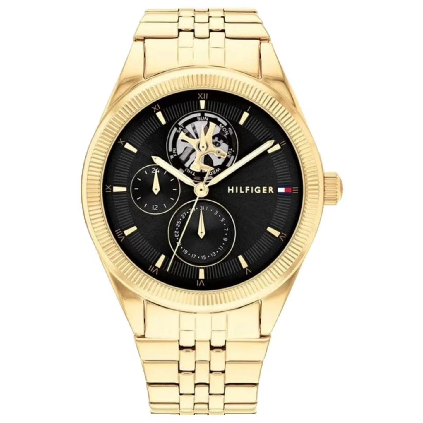 Tommy Hilfiger 1782717 women’s multifunction watch with black textured dial, open-heart display, and gold-tone stainless steel bracelet.