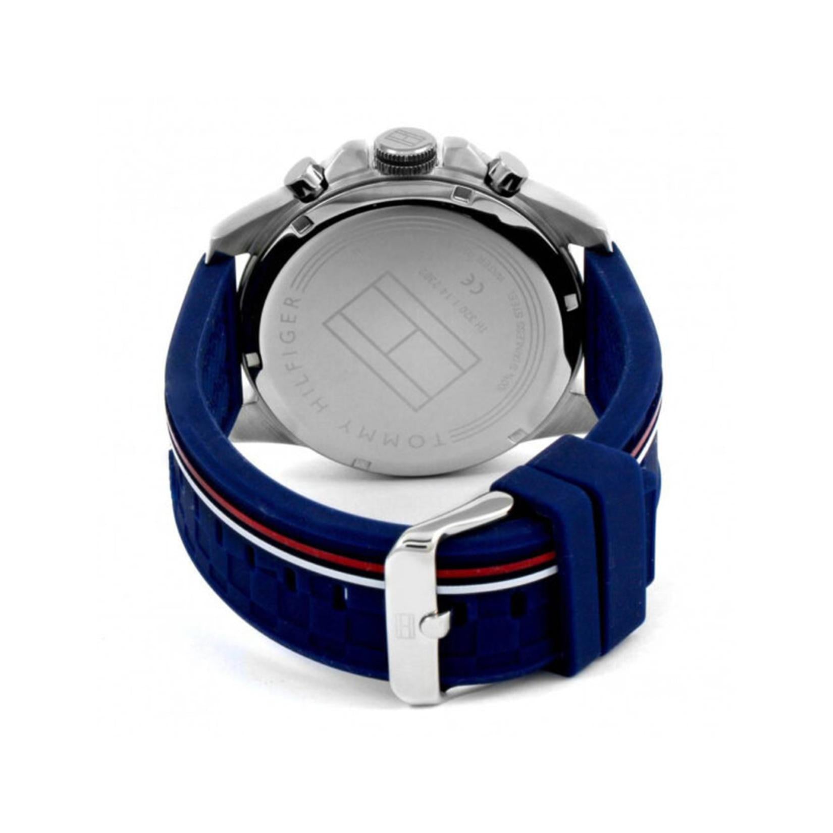 Tommy Hilfiger 1791476 with stainless steel caseback, pushers and blue silicone strap with striped detail and buckle.