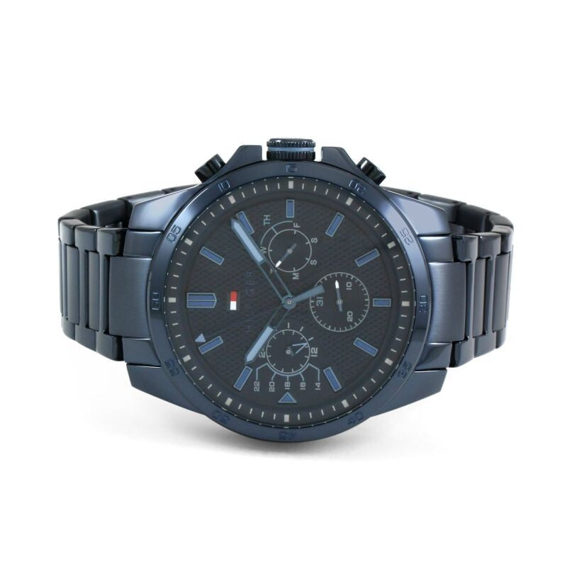 Tommy Hilfiger 1791560 men’s chronograph watch with textured blue dial, blue stainless steel case, and matching blue stainless steel bracelet shown in an angled view.