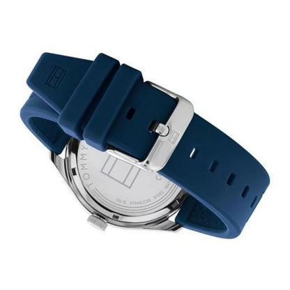 Tommy Hilfiger 1791885 rear angled view showing the blue silicone strap, silver-tone buckle clasp, and stainless steel caseback.