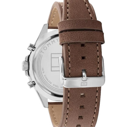 Tommy Hilfiger 1791983 rear view showing the stainless steel caseback, brown leather strap, and silver-tone buckle closure.